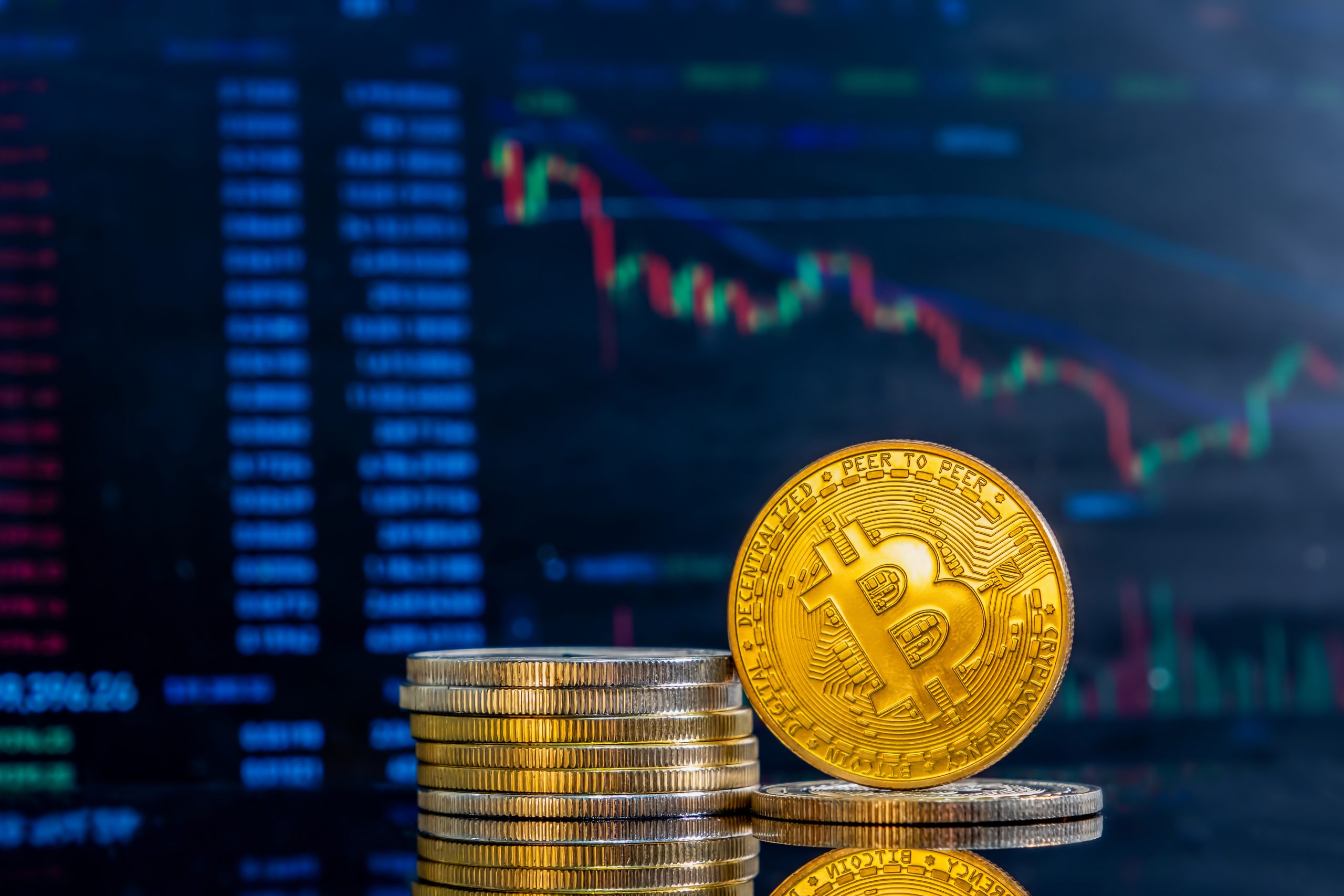 Illustration of popular cryptocurrencies like Bitcoin and Ethereum on a digital chart.”