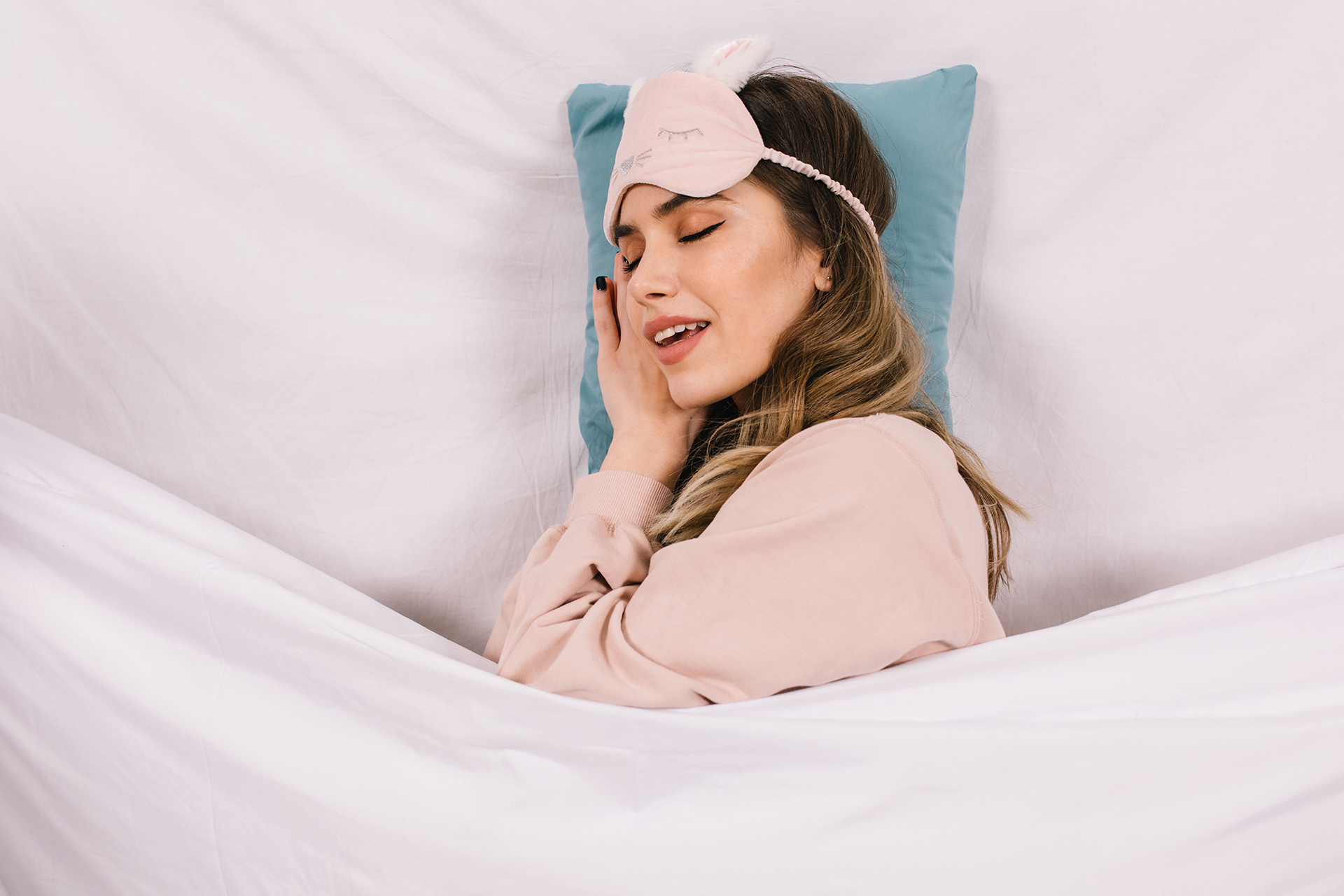 An adult peacefully sleeping on their back, demonstrating ideal rest posture for better sleep quality.